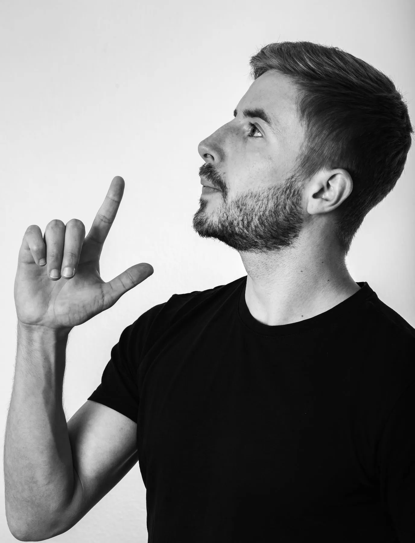 Aleš Prijatelj pointing upwards